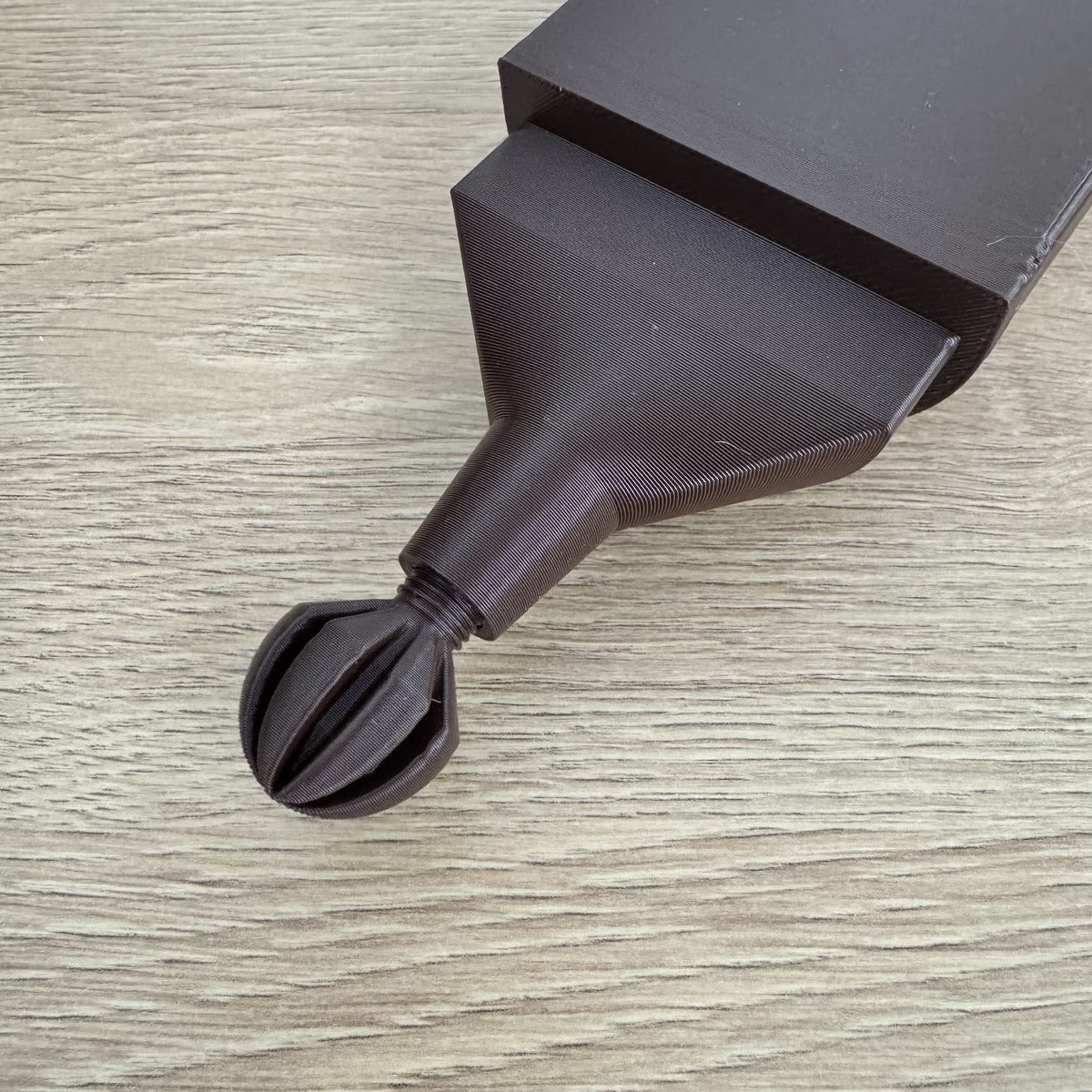 Close-up of the ModuMoss watering tank drip cap